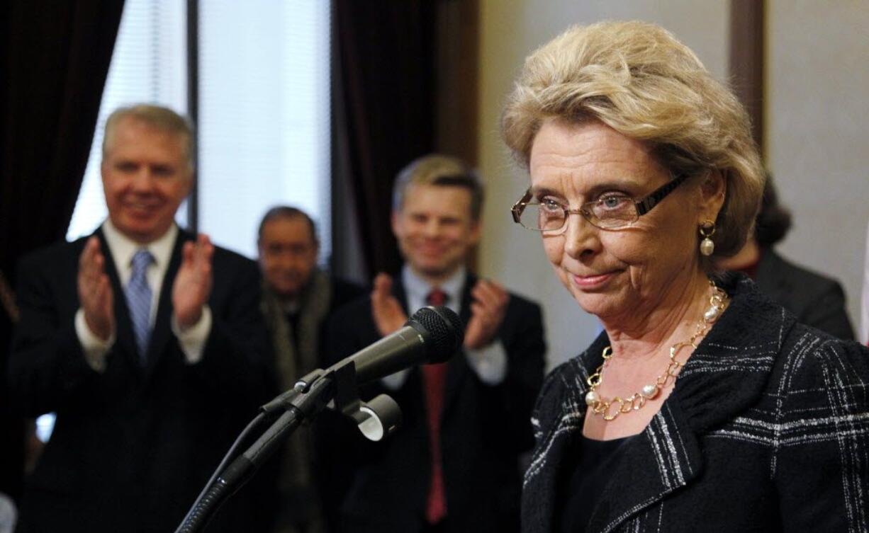 Rep. Ed Murray, D-Seattle, from left, and Rep. Jamie Pedersen, D-Seattle, applaud as Gov. Chris Gregoire speaks at a Jan. 4 news conference in Olympia where she said that she wants Washington to become the seventh state in the nation to make gay marriage legal.