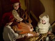 Zach Smith, 5, from left, Tyler Dixson, 6, and Alex Smith, 2, were dressed up as shepherds and a lamb while their moms, Chrissy Smith of Vancouver and Jocelyn Dixson of La Center, took pictures.