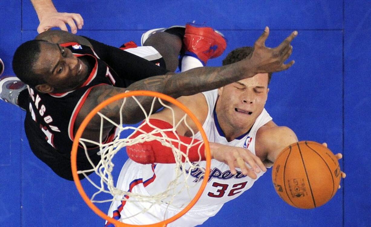 Blake Griffin, right, puts up a shot as Portland's forward J.J. Hickson defends during the first half Friday.