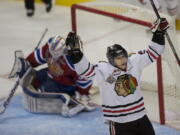 Winterhawks' Taylor Leier celebrates after assisting on a goal by Joseph Morrow against the Oil Kings in the third period of game 6 at the Rose Garden on Saturday.