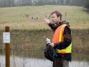 Kevin Gray, director of Clark County Environmental Services, talks about stormwater management at Fairgrounds Community Park in Ridgefield in January.