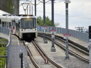 A Tri-Met Max light rail train makes its way to the Delta Park/Vanport light rail transit station May 6, 2010.