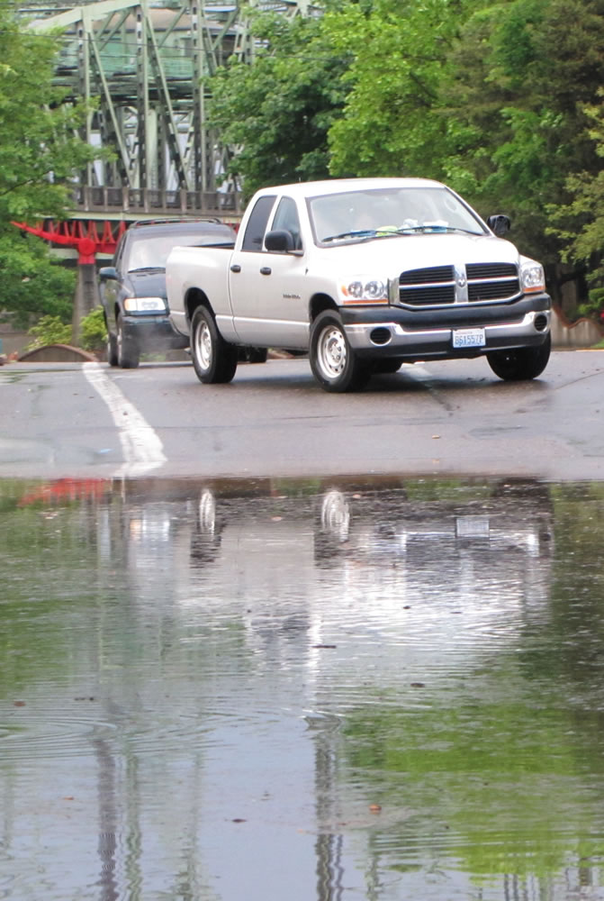 Motorists found their way blocked by a flooded railroad underpass on Columbia Street in downtown Vancouver after a thunderstorm passed through Saturday.