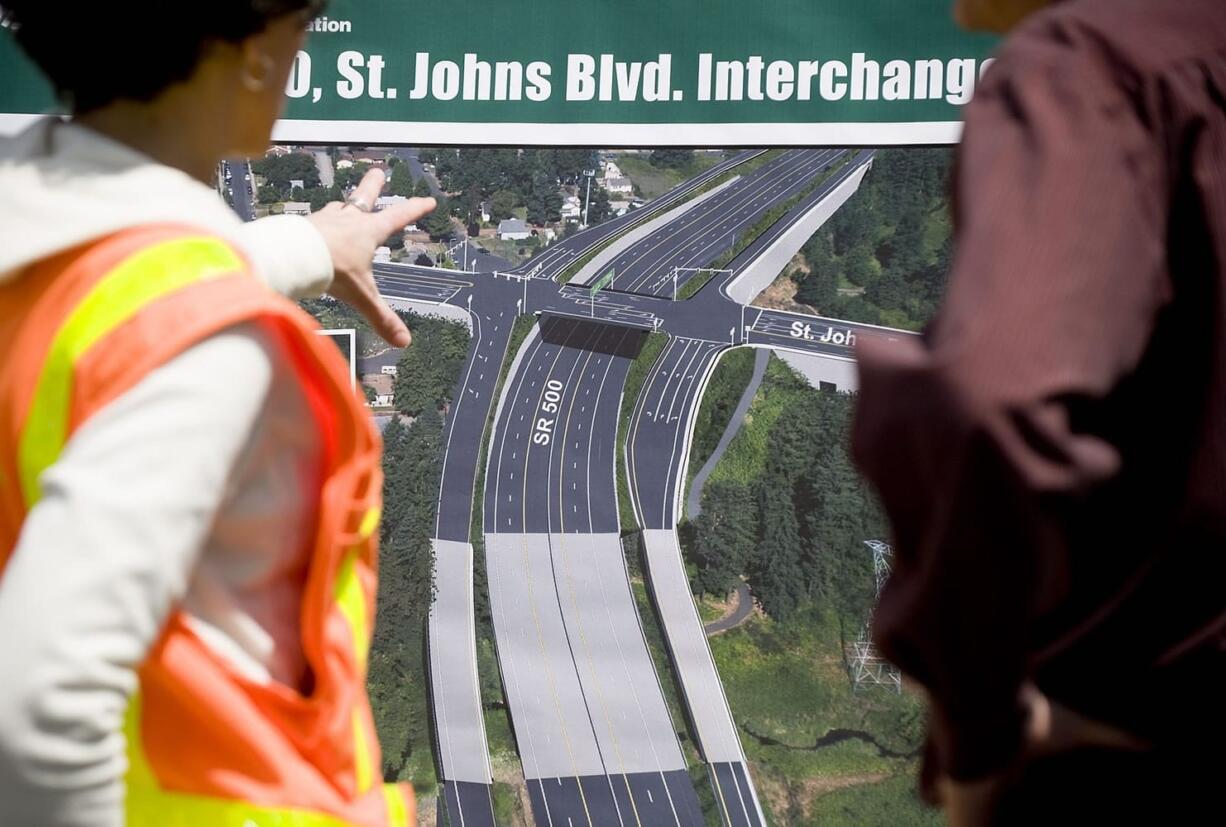 Officials review plans for the St.