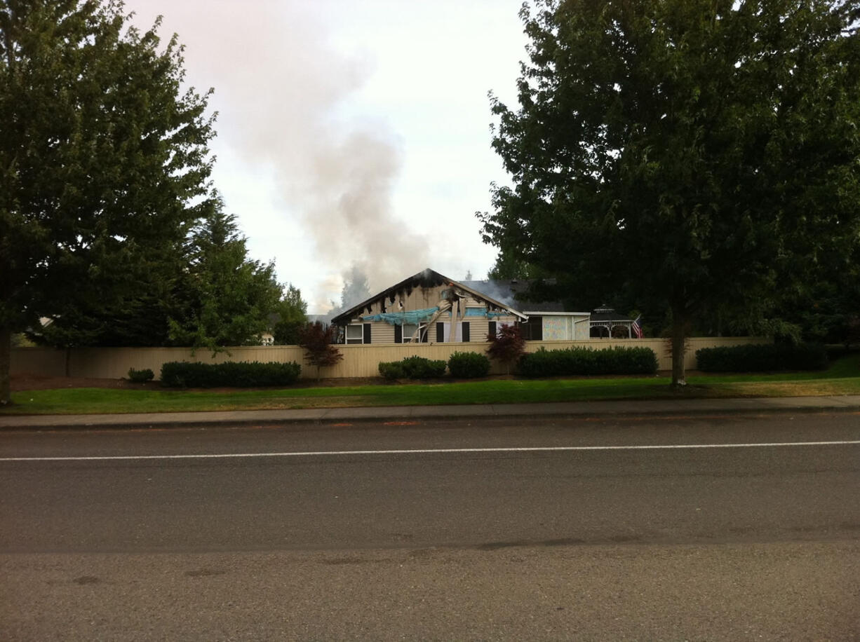 A man burning weeds accidently set this house ablaze Monday in east Vancouver.