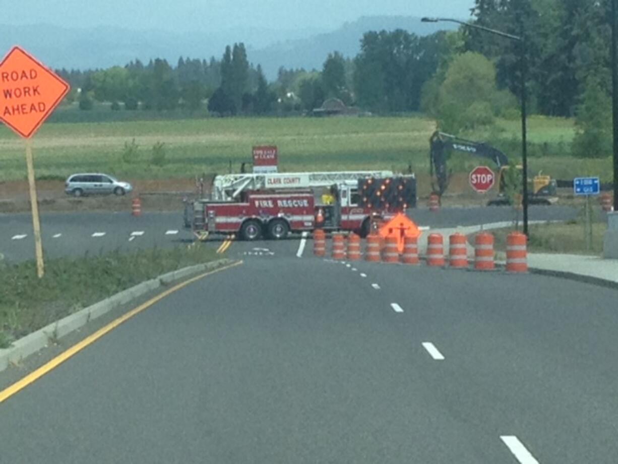 A firetruck helps block traffic at the scene of a natural gas leak in Ridgefield on Thursday.