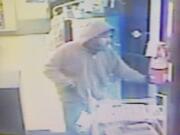 Surveillance video of the suspect in an armed robbery at Speed-E Mart, 3208 E.