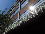 Spokane-based Sterling Savings Bank's parent company is laying off 6 percent of its workforce.