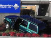 No injuries were reported Thursday when this SUV crashed into Riverview Community Bank's sign at its Salmon Creek Branch, 800 N.E. Tenney Road, about 1:50 p.m.