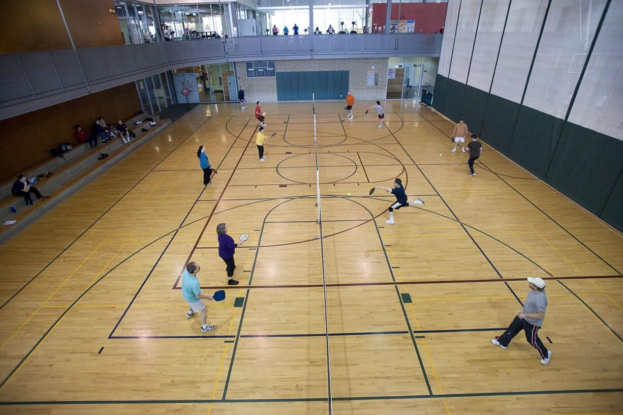 Pickleball games in full swing at the Firstenburg Community Center, Sunday, February 7, 2010.