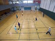 Pickleball games in full swing at the Firstenburg Community Center, Sunday, February 7, 2010.