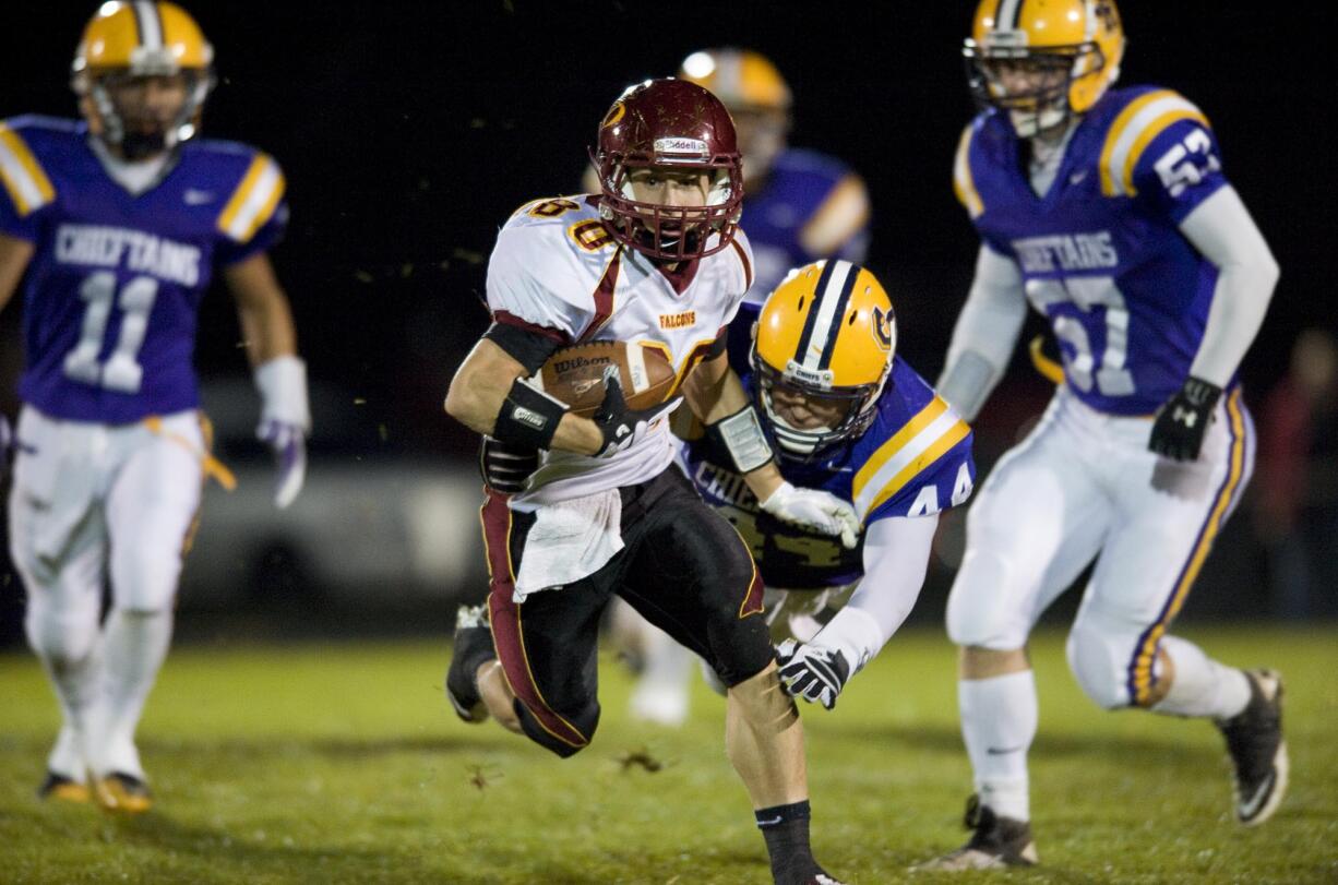 Prairie High School's Jesse Zalk, #80, makes a reception on the first play from scrimmage for a big gain to set up his team's first score against Columbia River, Friday, October 7, 2011.