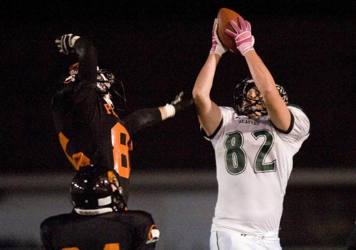 Woodland's Nick Fuller, #82, hauls in the game winning touchdown pass in overtime to beat Washougal 35-28 at Fishback Stadium in Washougal, Firday, October 14, 2011.