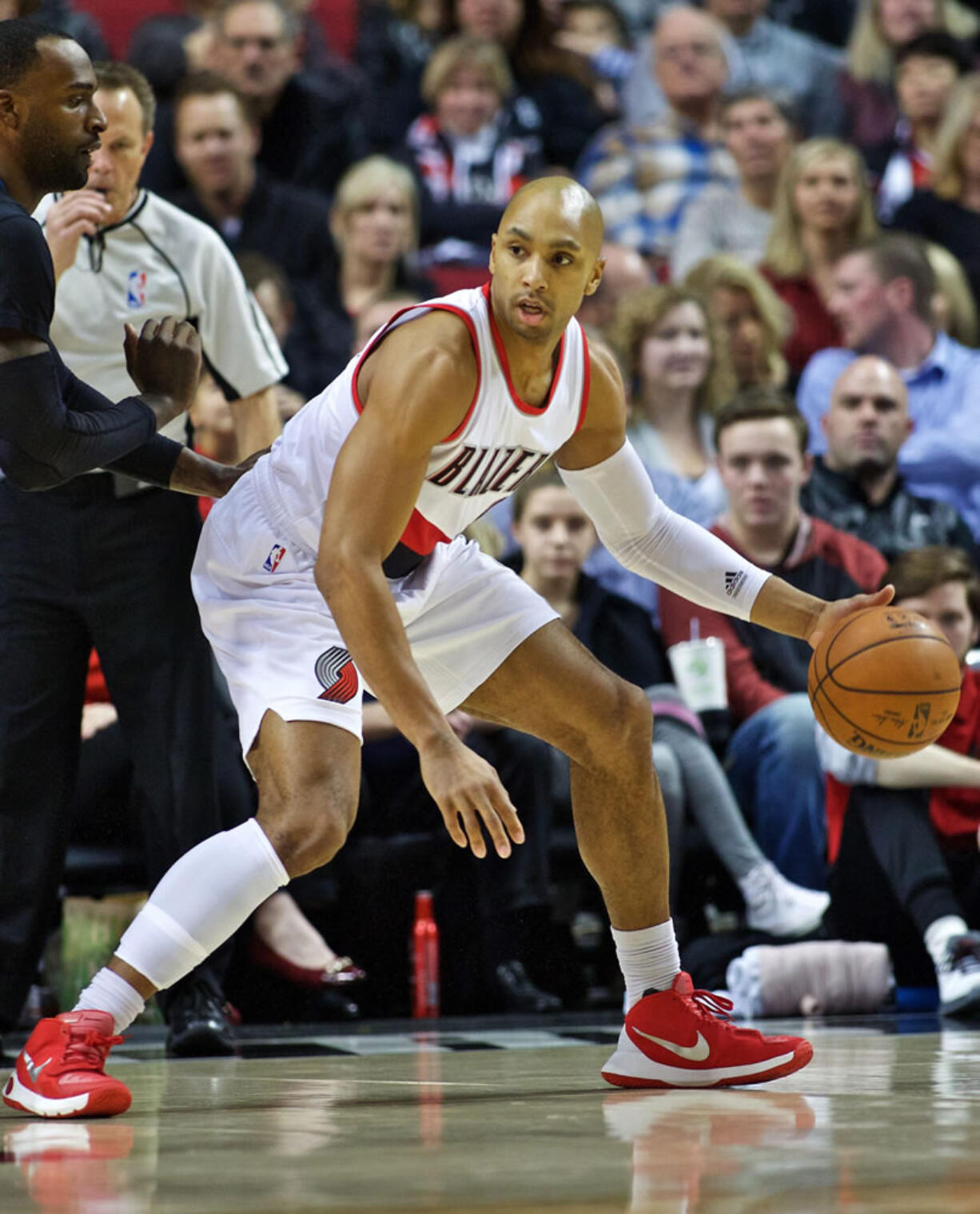 Portland Trail Blazers guard Gerald Henderson posts up against the Minnesota Timberwolves during the first half of an NBA basketball game in Portland, Ore., Sunday, Jan. 31, 2016. The Trail Blazers won 96-93.