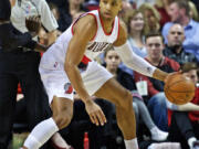Portland Trail Blazers guard Gerald Henderson posts up against the Minnesota Timberwolves during the first half of an NBA basketball game in Portland, Ore., Sunday, Jan. 31, 2016. The Trail Blazers won 96-93.