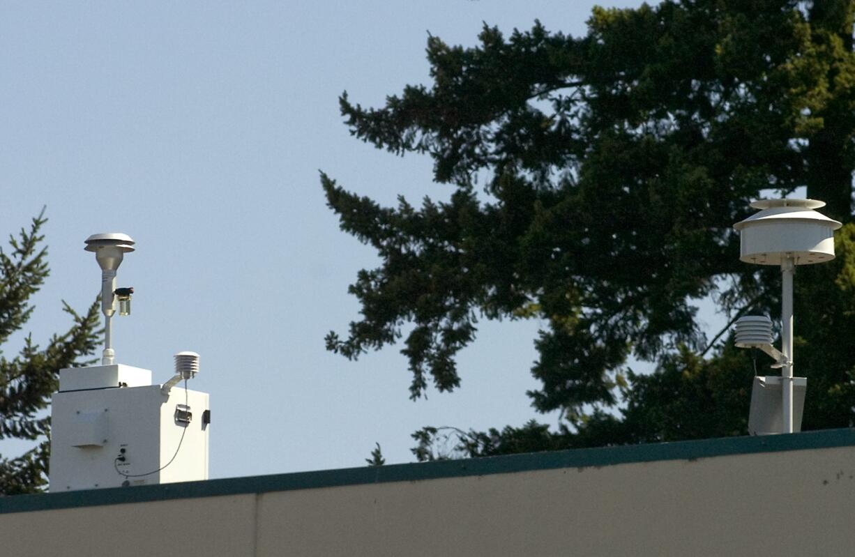 An air quality monitoring station sits on the roof of Vancouver Christian High School in Vancouver's Ogden neighborhood on  July 24, 2008.