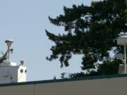 An air quality monitoring station sits on the roof of Vancouver Christian High School in Vancouver's Ogden neighborhood on  July 24, 2008.