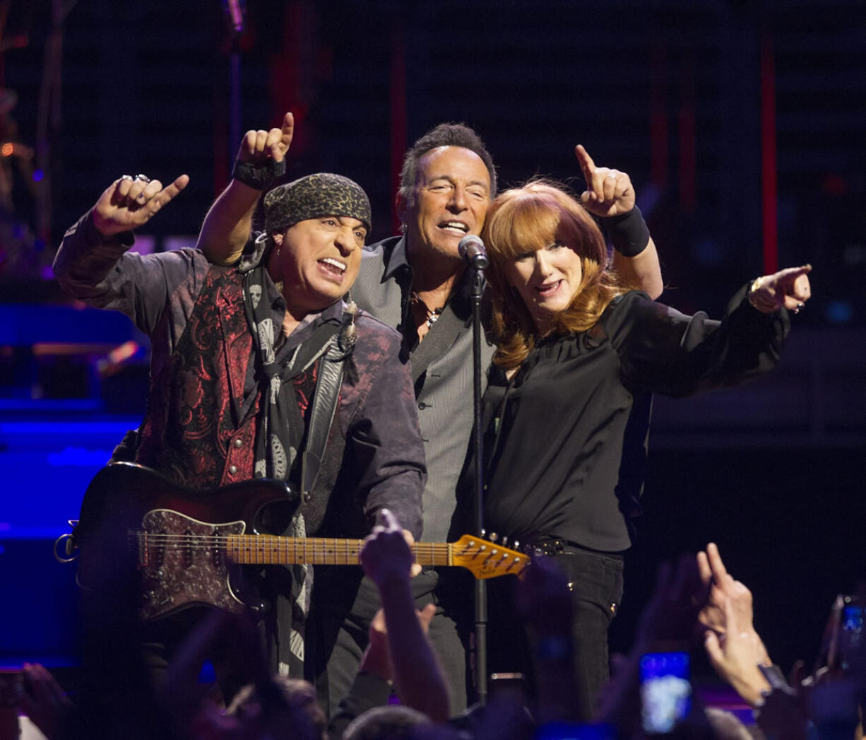 Steven Van Zandt, from left, Bruce Springsteen, and Patti Scialfa come together at the end of &quot;Sherry Darling&quot; during Bruce Springsteen &amp; The E Street Band&#039;s perfor mance in Philadelphia on Feb. 12.