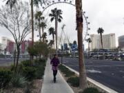 Kari Wright rides an EcoReco Scooter in Las Vegas.