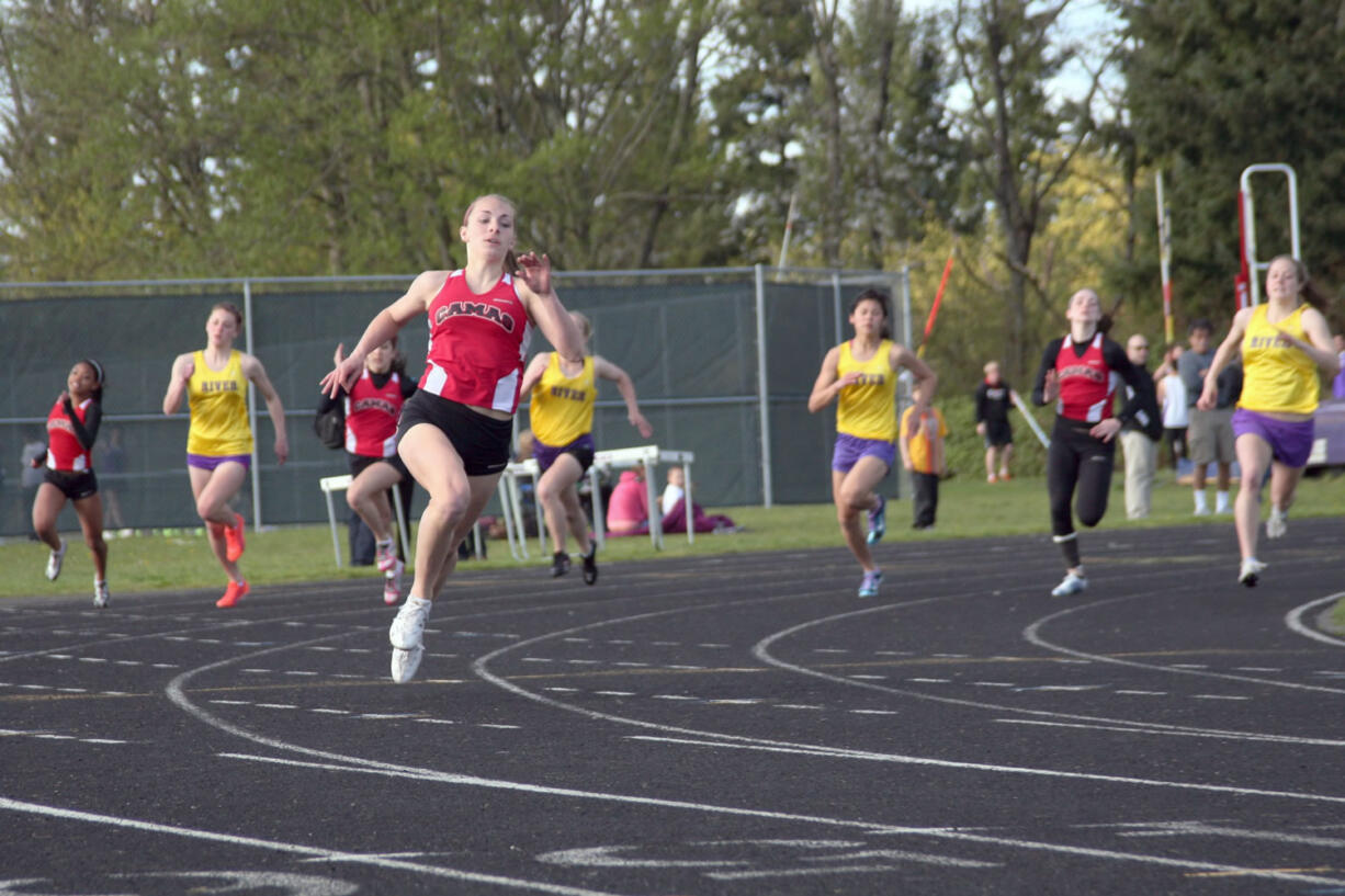 Camas senior Megan Kelley leaves the competition in a daze during the 200-meter dash May 3, at Columbia River High School.