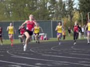 Camas senior Megan Kelley leaves the competition in a daze during the 200-meter dash May 3, at Columbia River High School.