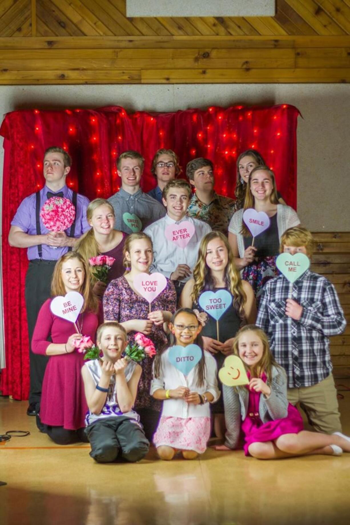 Members of youth group enjoying their Valentine&#039;s dinner and fundraiser at St John Lutheran Church.