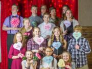 Members of youth group enjoying their Valentine&#039;s dinner and fundraiser at St John Lutheran Church.