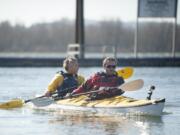 On Monday, Deputy Director of the Lower Columbia Estuary Partnership Chris Hathaway, left, and Columbian reporter Dameon Pesanti kayak at the Port of Camas-Washougal, a stop on the Lower Columbia River Water Trail.