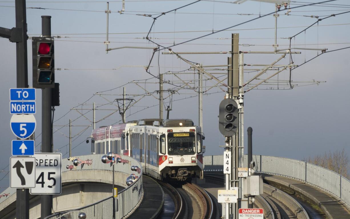 A MAX train approaches the Kenton/North Denver stop in Portland in 2013.