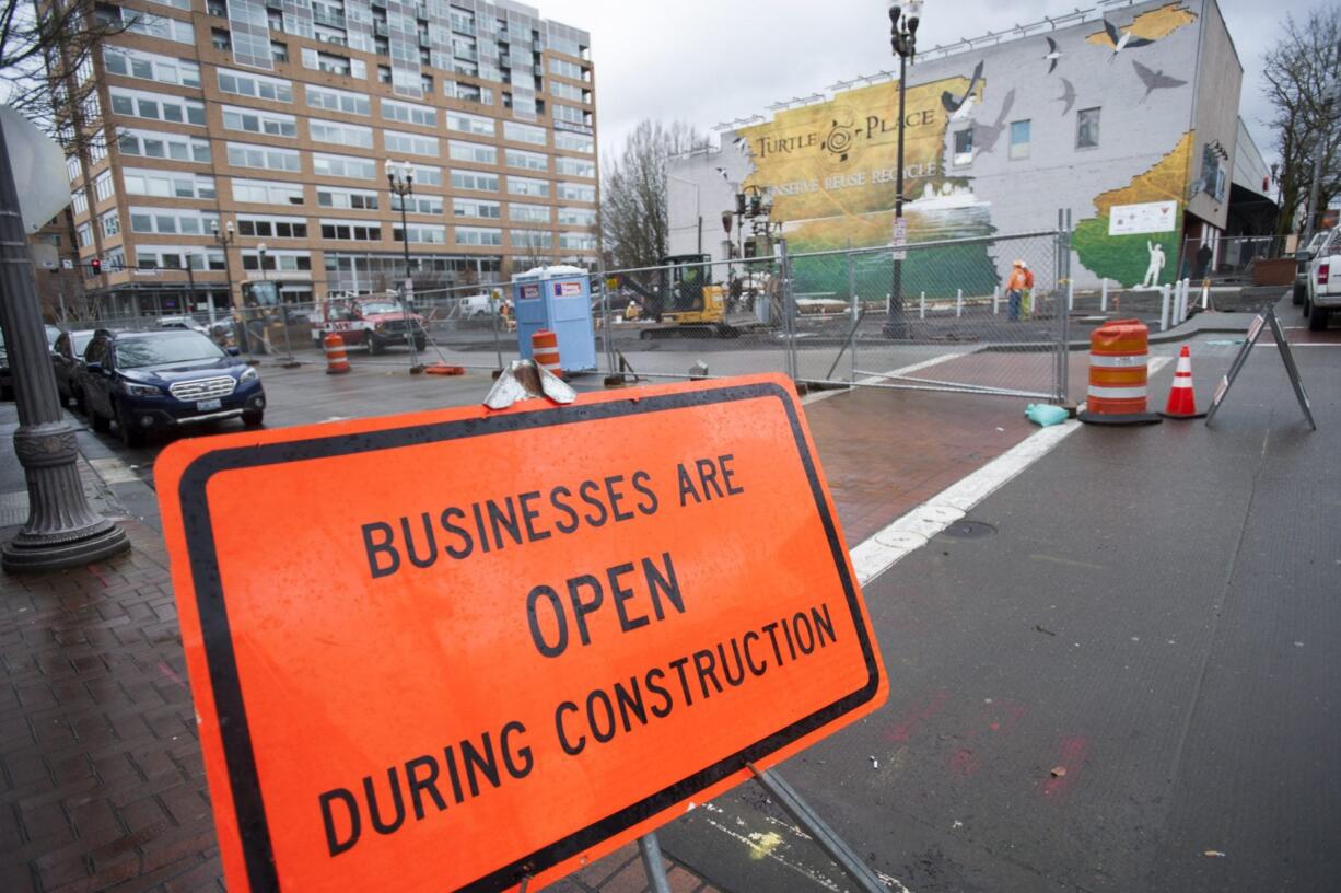 Construction takes place on The Vine&#039;s Turtle Place station in downtown Vancouver on Friday. Turtle Place will be the first to see the &quot;walking sticks&quot; elements central to the design of the system&#039;s stations.