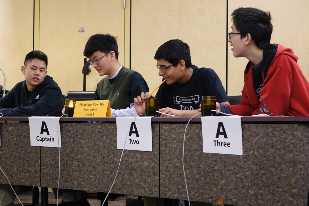 Mountain View High School Team 1 of the Evergreen School District performed the best of the schools in your readership. They persevered through Round 10 in the afternoon Double Elimination Rounds. Pictured are Mark Chen, team captain Ming Liu, Suyash Gupta and Kevin Gao.