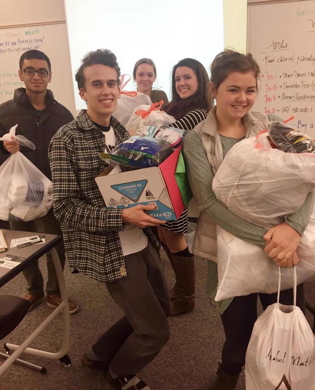 Camas: Camas High School&#039;s National Honor Society collected 617 pairs of socks in December as part of a sock drive for youths in Portland.