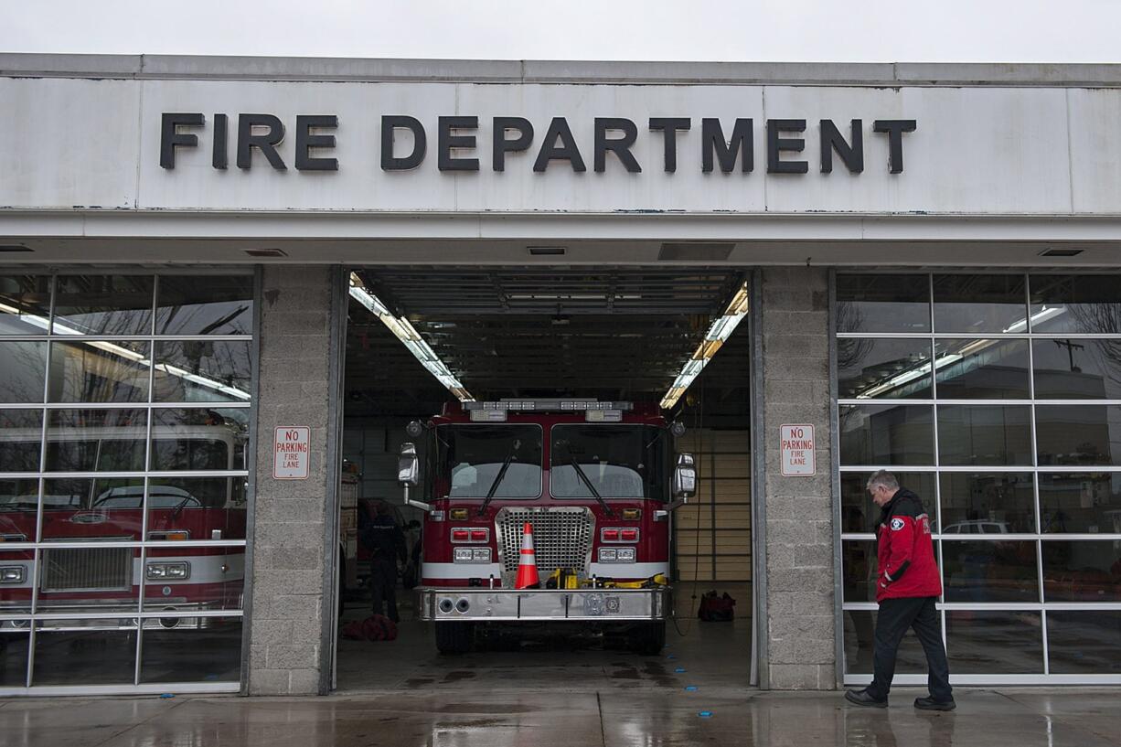 Clark County Fire District 3 Assistant Chief Scott Sorenson strolls past the outside of the Battle Ground fire station on Feb. 4.