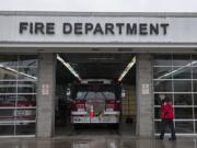 Clark County Fire District 3 Assistant Chief Scott Sorenson strolls past the outside of the Battle Ground fire station on Feb. 4.