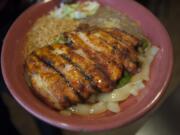 Pollo asado, a grilled boneless fillet of chicken with green pepper and mushrooms, is served Feb. 4 at Los Potrillos Mexican Restaurant in east Vacouver. The dish costs $15.95.
