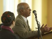 Dr. Khalid Khan of the Islamic Society of Southwest Washington gives a blessing at an interfaith breakfast in 2014.