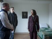 Sen. Maria Cantwell, D-Wash., talks to Dave Gunsul, President of Team Construction, left, and Ryan Dooley as she tours the soon-to-open Lincoln Place in downtown Vancouver, a 30-unit studio apartment complex for chronically homeless people.