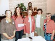 Battle Ground: Philanthropic Educational Organization members Anna Morrison, left, Beverly Osieck, from center, Becky Robert and Julie Tanner present an education grant to Melissa Macaree, second from left.