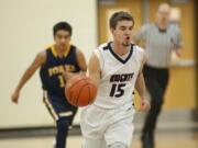 King's Way's Kyle Gonzales, center, leads a fast break in the second quarter Friday night, Feb. 12, 2016 at King's Way gym.