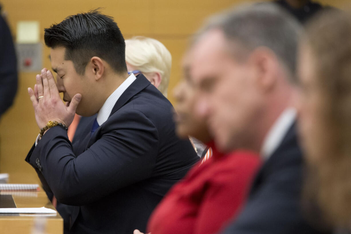 Officer Peter Liang reacts as the verdict is read Thursday during his trial at Brooklyn Supreme Court in New York.