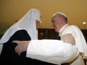 The head of the Russian Orthodox Church Patriarch Kirill, left,  and Pope Francis meet at the Jose Marti airport in Havana, Cuba, Friday. This is the first-ever papal meeting with the head of the Russian Orthodox Church, a historic development in the 1,000-year schism within Christianity.