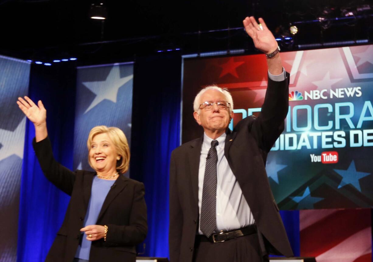 Democratic presidential candidates, Hillary Clinton and Sen. Bernie Sanders, I-Vt,  stand together Jan. 17 before the start of the NBC, YouTube Democratic presidential debate at the Gaillard Center in Charleston, S.C.