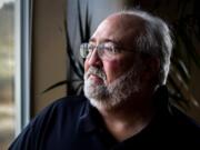 Steve Hawks looks out a window of his office at Northwest Senior &amp; Disability Services in Warrenton, Ore., this month. Hawks, an adult protective service worker through Northwest Senior &amp; Disability Services, is tasked with investigating elder abuse in Clatsop County.