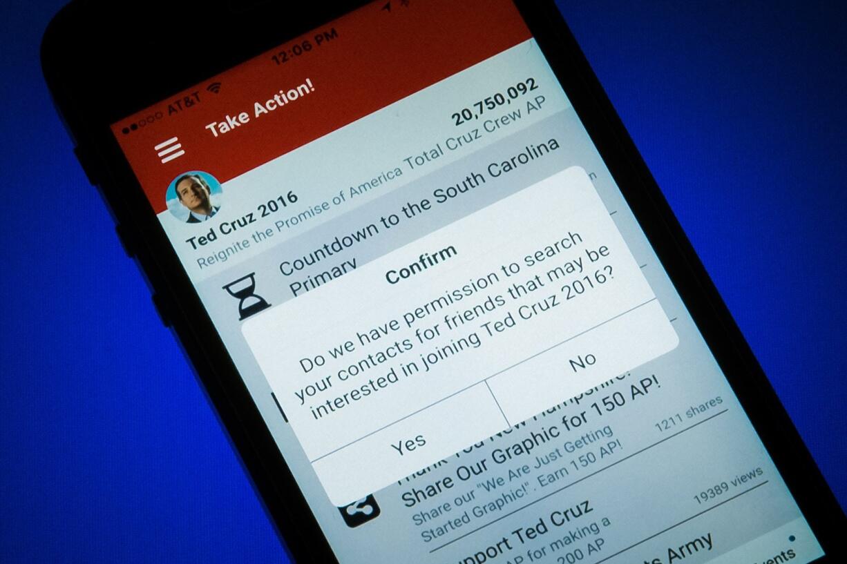 A request to search your contacts by the Ted Cruz mobile app is shown Thursday on an iPhone in the Washington Bureau of the Associated Press. (J.
