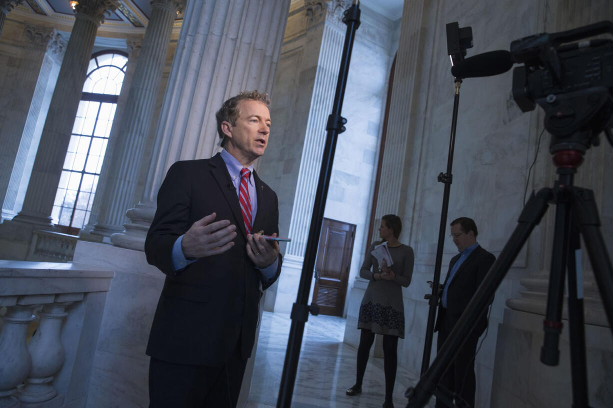 Sen. Rand Paul, R-Ky., speaks to WBKO in his hometown, Bowling Green, Ky., on Capitol Hill in Washington on  Wednesday after announcing he is dropping his 2016 campaign for president.  Eclipsed by other conservative candidates in the crowded 2016 field, he is now expected to turn his full attention to his Senate re-election campaign in Kentucky. (AP Photo/J.