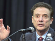 Louisville head basketball coach Rick Pitino speaks to the media following the University's announcement that they will be self-imposing a ban on postseason play for the 2015-16 season, Friday, Feb. 5, 2016, in Louisville Ky. Louisville announced a one-year postseason ban for its men's basketball team amid ongoing investigations into a sex scandal in which an escort alleged that a former staffer paid her and other dancers to strip and have sex with recruits and players. (AP Photo/Timothy D.