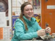 Student Holly Halberg sculpts with clay in her art class at Battle Ground High School earlier this month. She is the state winner in the Doodle 4 Google contest. Online voting will determine whether her artwork advances to the top five in the national contest.