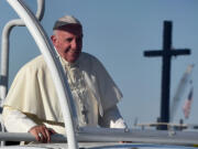 Pope Francis smiles upon arrival at the US-Mexico border in Ciudad Juarez, Mexico, Wednesday, Feb. 17, 2016. After a brief moment of prayer, Francis got back on his popemobile to head for the fairgrounds, where he celebrated his last Mass during a five-day Mexico tour.