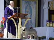 Pope Francis delivers his message during Mass, on a stage decorated with animals in San Cristobal de las Casas, Mexico, on Monday. Francis is celebrating Mexico&#039;s Indians on Monday with a visit to Chiapas state, a center of indigenous culture, where he will preside over a Mass in three native languages thanks to a new Vatican decree approving their use in liturgy. The visit is also aimed at boosting the faith in the least Catholic state in Mexico.