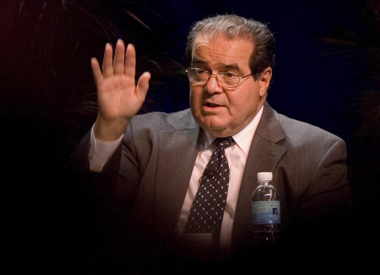 Supreme Court Associate Justice Antonin Scalia speaks at the ACLU Membership Conference in Washington. On Saturday, the U.S. Marshals Service confirmed that Scalia has died at the age of 79.